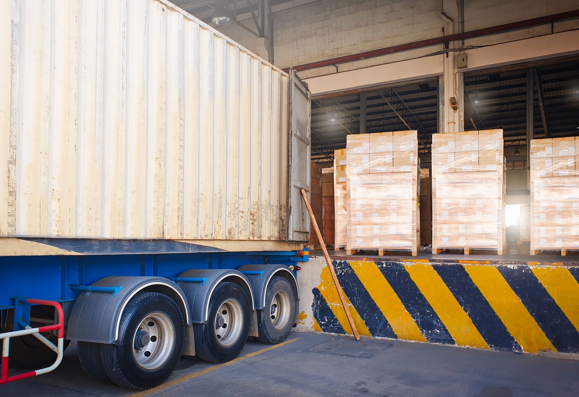 Container Trucks Parked Loading Package Boxes Pallets at Warehouse Dock. Supply Chain, Merchandise, Distribution Warehouse Shipping, Supplies Shipment. Freight Truck Logistic, Cargo Transport.